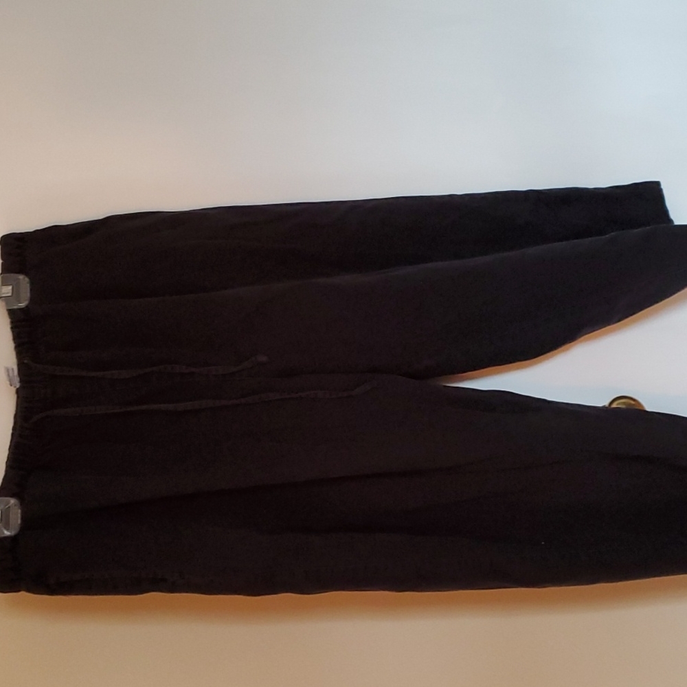 Jonathan Logan ankle pants in black.